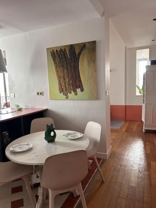 Un Fabuleux Decor Pour Un Chaleureux Appartement Paris Exterior photo